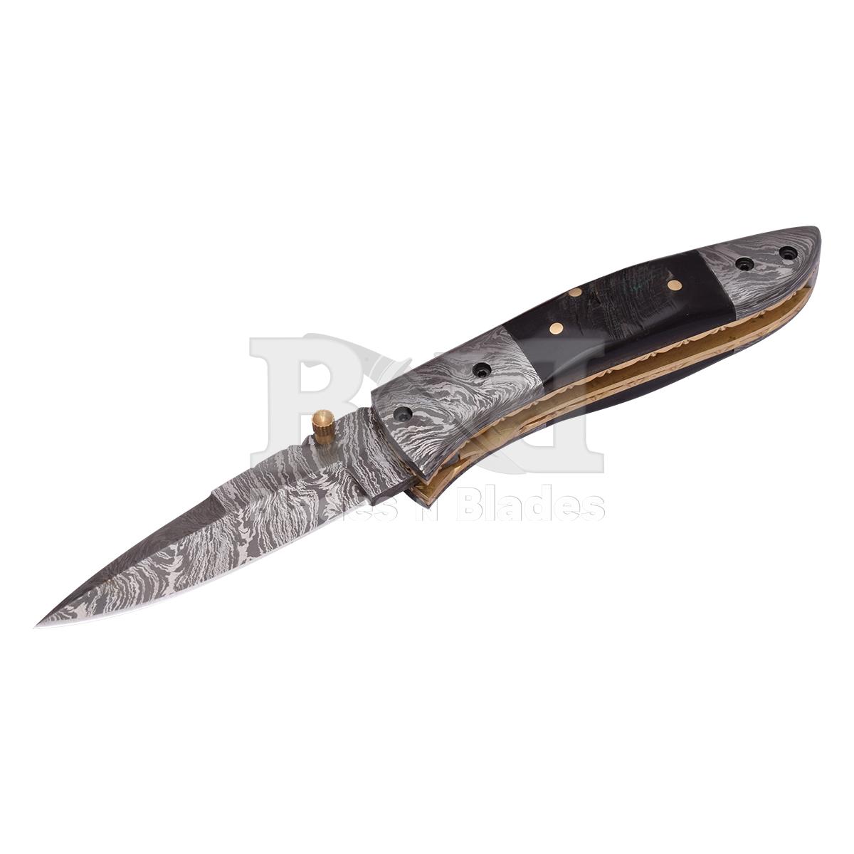 Fire Pattern
Ram horn handle with brass pin
Damascus steel bester